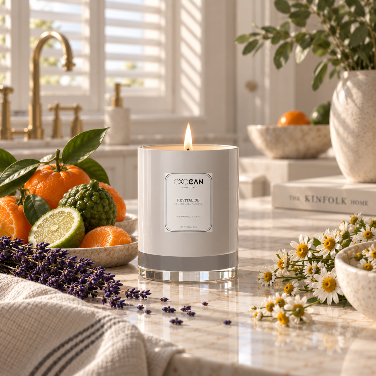 Oxocan Revitalise CBD-infused candle lit in a bright classic kitchen